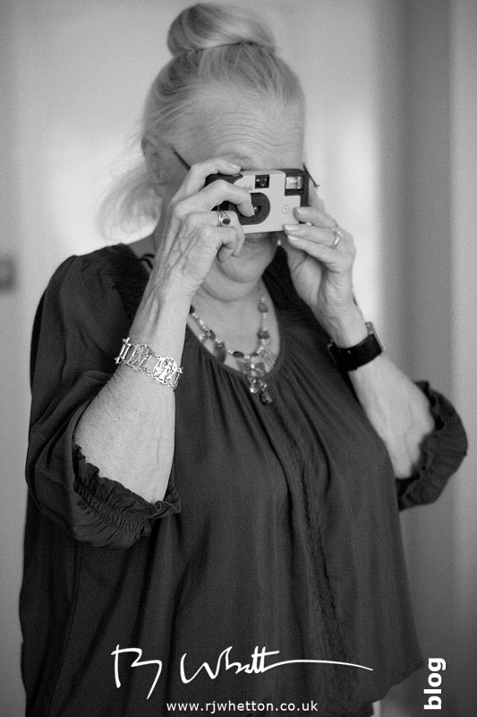 Rebecca's mum can't resist photographs with her disposable - Professional Wedding Photography Dorset