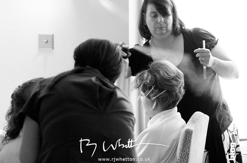 Rebecca spends some time having her hair done - Professional Wedding Photography Dorset