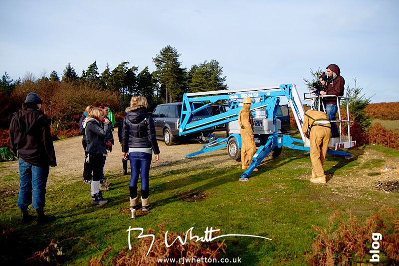 Film crew strap into crain - Production Photography Dorset