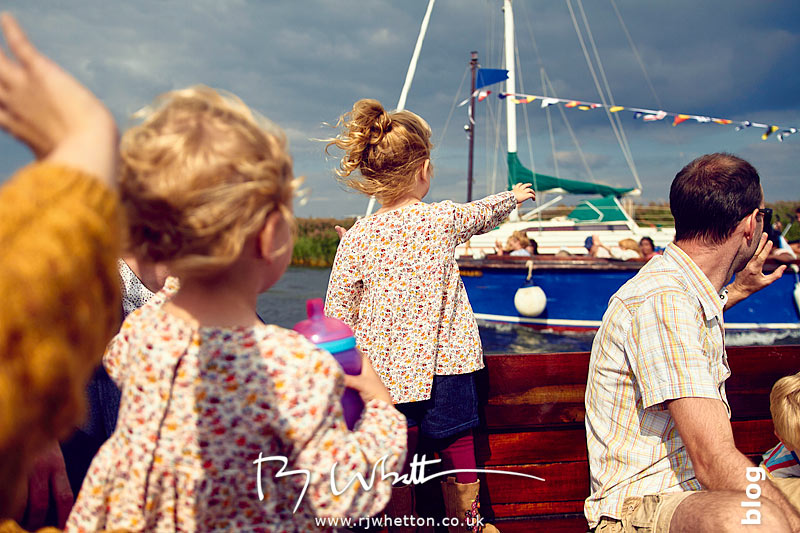 Everyone waving at boat - Portrait Photography Dorset