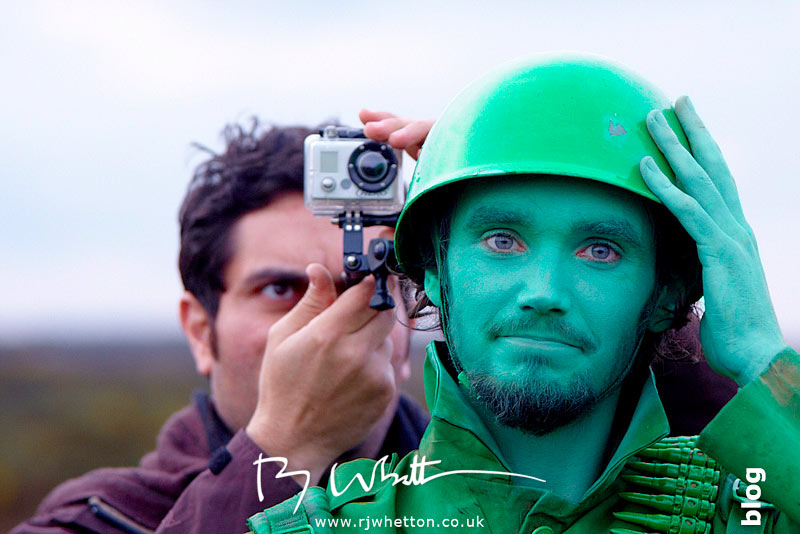Film crew attaches GoPro to actors helmet - Production Photography Dorset