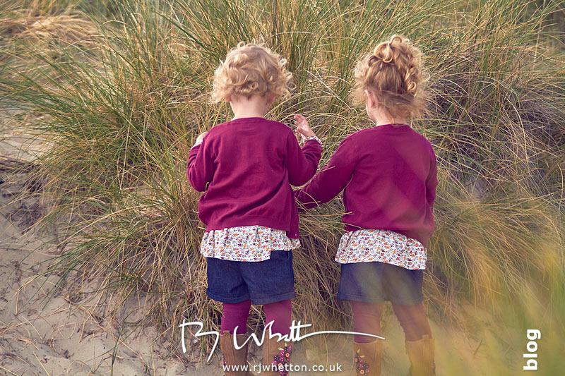 Harper and Scout hiding while playing hide and seek with mum- Portrait Photography Dorset
