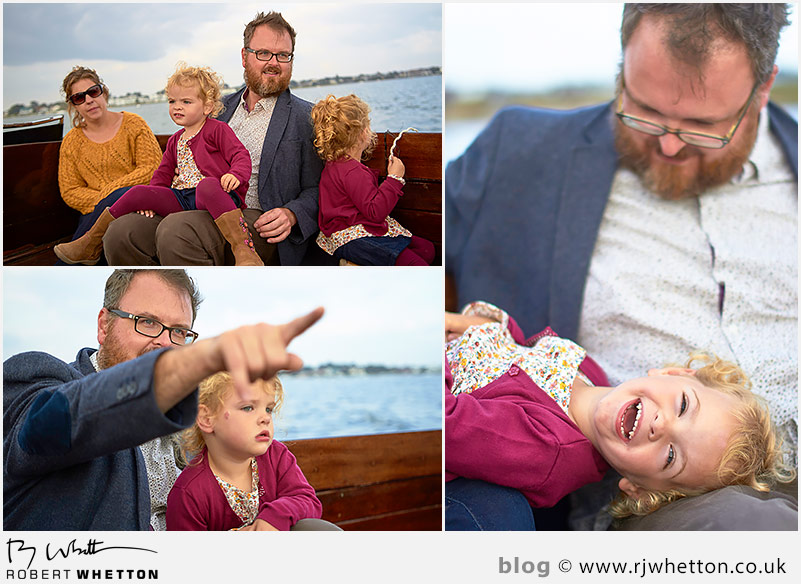 Harper being tickled by dad on the boat - Portrait Photography Dorset
